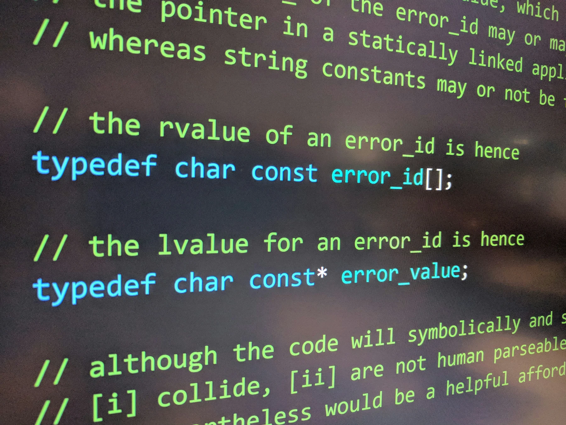 Development screen showing C++ source code and comments about lvalue and rvalue references.
